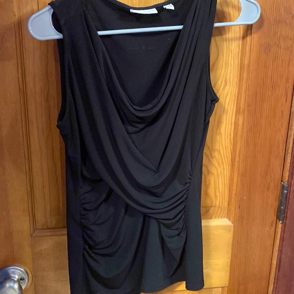 Black sleeveless draping blouse
